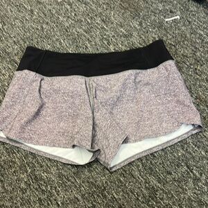 Poolside s 8 Lululemon shorts slightly stained small hole-bottom unnoticeable